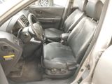 the interior of a car with black leather seats and a steering wheel