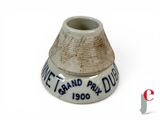 a white vase with a black writing on it