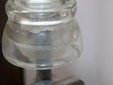 a close up of a glass jar on a table