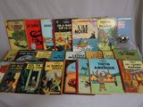 a lot of books that are on a table
