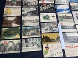 many old postcards on the table together