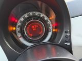 a close up of a speedometer on a car ' s dashboard