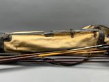 a bag with a bunch of sticks in it on a table