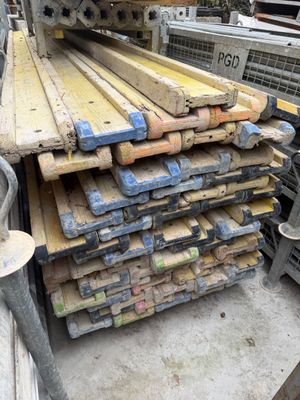 a lot of wood planks stacked on top of each other