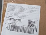 a box with a sticker on it sitting on a table