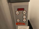 a close up of a machine with buttons on it
