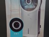 la boîte est ouverte sur une table et contient un ventilateur