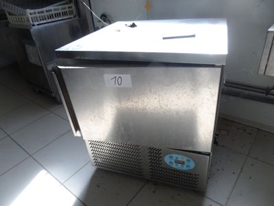 an image of a stainless steel refrigerator in a kitchen