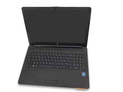 a black laptop computer sitting on top of a white surface