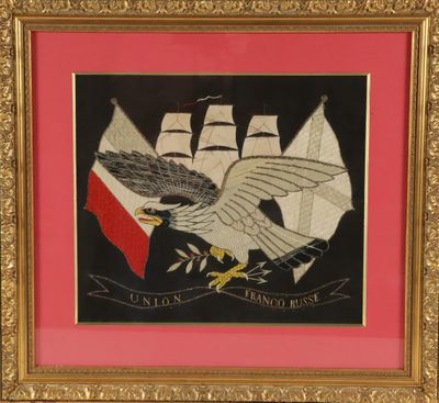 an image of a picture of an eagle flying over a ship