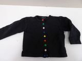a black sweater with multi colored buttons on it
