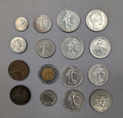 a lot of coins that are on the table