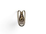 a close up of a metal hook with a horse on it