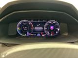 the dashboard of a car with a digital display in the center