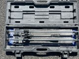a tool kit in a plastic case on the ground