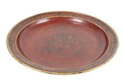 a brown plate with a gold rim on a white background