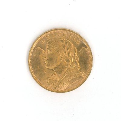 l'image d'une pièce d'or sur laquelle figure le visage d'une femme