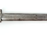 a knife that is laying on a white surface