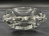 a clear glass bowl with a design on the inside of it