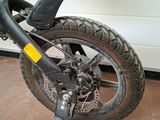a close up of a bicycle parked in a garage