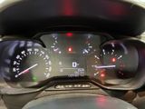 a close up of a car dashboard with a speedometer and gauges