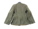 the jacket is green and has a white stripe on the collar