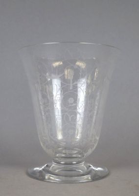 a glass vase that has a pattern on it