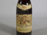 a bottle of wine that is sitting on a table