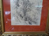 dessin d'un arbre dans un cadre doré sur fond rouge