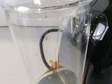 a blender that has a cup in it on a counter