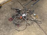 a pile of wires and other items on the ground