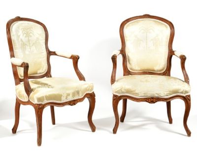 pair of louis xv style carved walnut armchairs