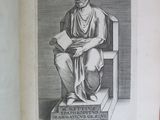 a book with a picture of a man sitting on a chair