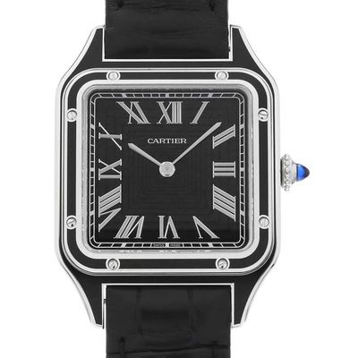 a close up of a wrist watch with roman numerals on the face