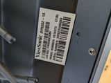 a metal door with a barcode on it and a barcode on the door