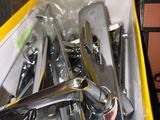 a yellow box filled with tools and a pair of scissors