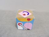 a small box with a picture of a fork and a spoon on it