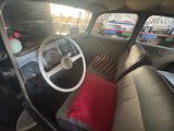 a dashboard and steering wheel of a small car