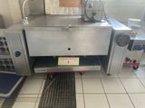 an image of a commercial kitchen with stainless steel appliances
