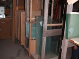 many boxes stacked on top of each other in a room
