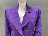 an image of a mannequin wearing a purple suit
