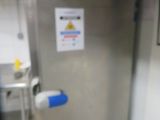 an image of a stainless steel refrigerator in a kitchen