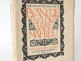 an old book with a black and orange design on it