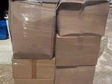 a large stack of boxes sitting on top of a pallet