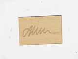 a picture of a wooden plaque with a name on it