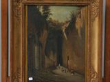 painting on easel in front of a painting of a man and a dog