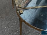a table that has a mirror on top of it