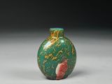 chinese jade snuff bottle with red and green decoration