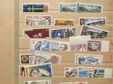 a picture of a refrigerator with many different stamps on it