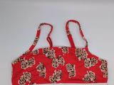 a close up of a red bra top with a tiger print on it